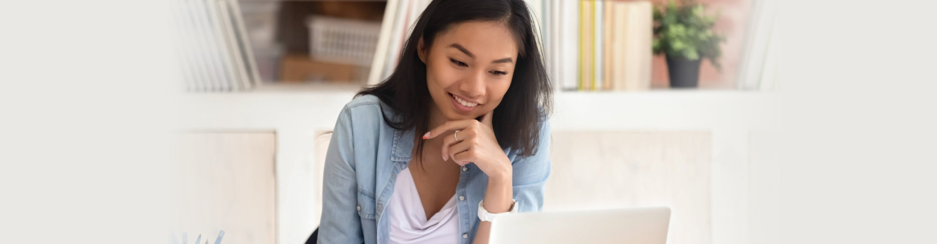 young lady using laptop