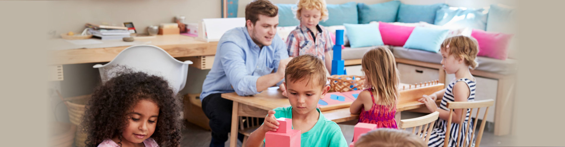 teacher and pupils playing